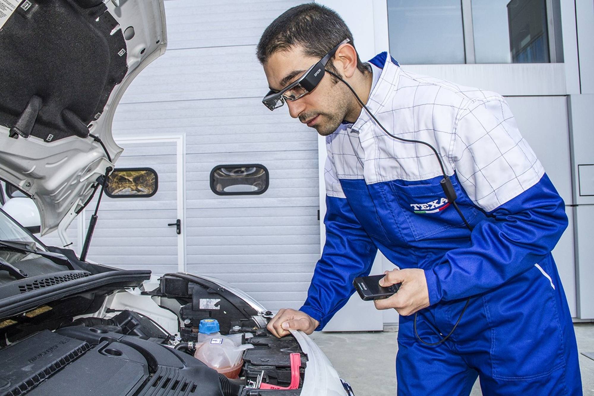 Entretien réparation climatisation pour BMW Mini chez Hautot et Fils